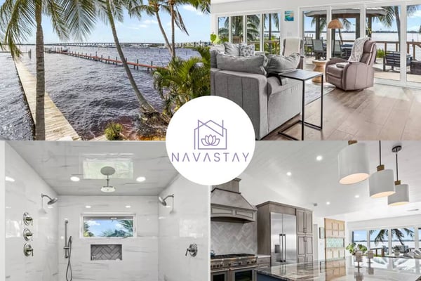 Waterfront home with palm trees, dock, modern living room, spa bathroom, and kitchen with island